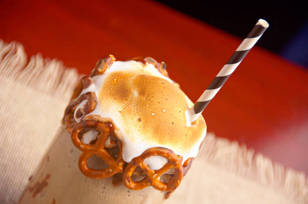 Iced chocolate milk drink with cookies