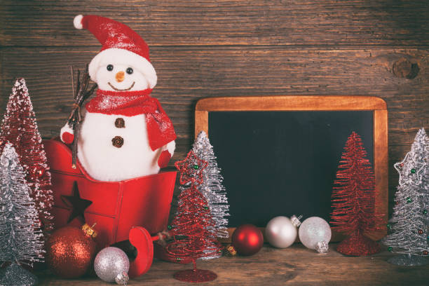istock Blackboard with Christmas decoration on wood over rustic background with copy space for text 1072789006