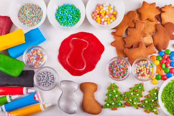 istock Supplies for preparing Christmas cookies decoration on a white table 1072789218