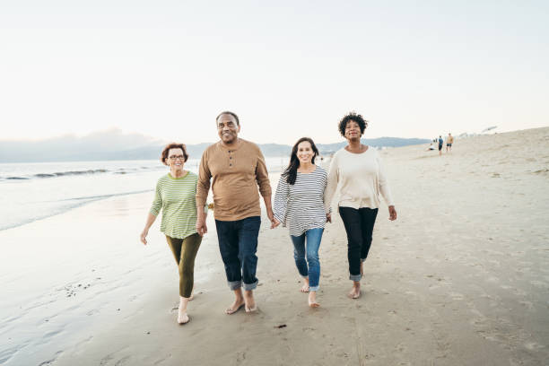 istock Active seniors by the seashore 1072792590