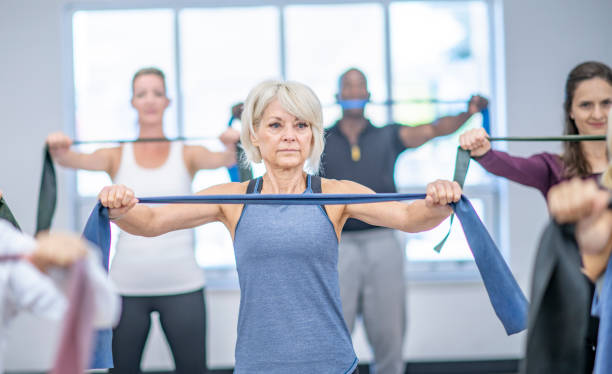 istock Seniors working out in a fitness class 1072799668