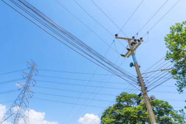 istock Electricity concept. Close up high voltage power lines station. 1072807634