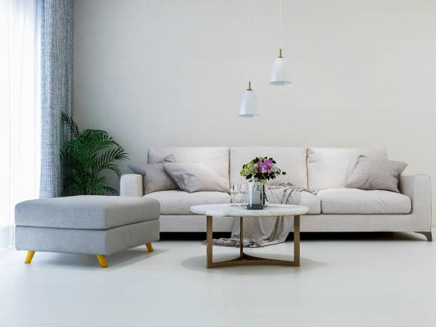istock Modern clean and simple living room design, couch and coffee table, coffee table and other things, a green plant in the corner 1072836216