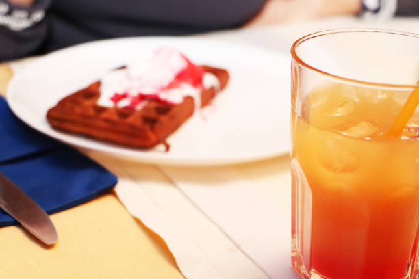 istock Belgian waffle on a table in a cafe 1072843130