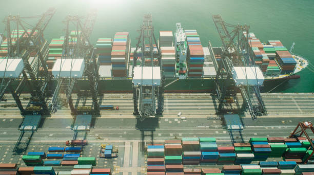 istock Ship loading with containers. Shipping cargo commercial logistics industry Aerial view 1072844670