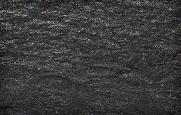 istock Dark grey black slate stone background or texture 1072848296