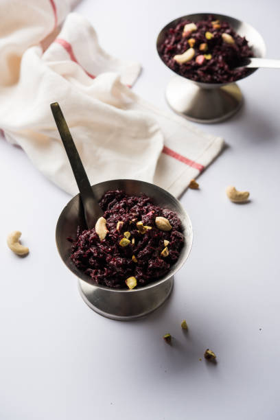 Beetroot Halwa garnished with Pistachio served in a bowl, selective focus
