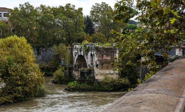 istock Rome cityscape - An old bridge in Rome 1072874704