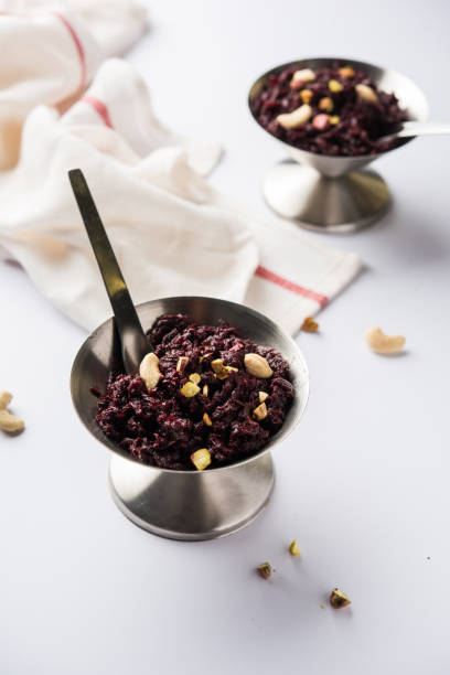 Beetroot Halwa garnished with Pistachio served in a bowl, selective focus