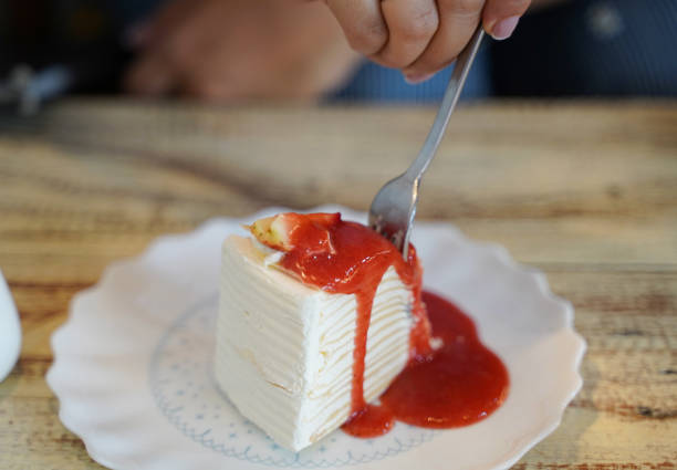 istock Crepe cake is topped with Strawberry jam. 1072898154