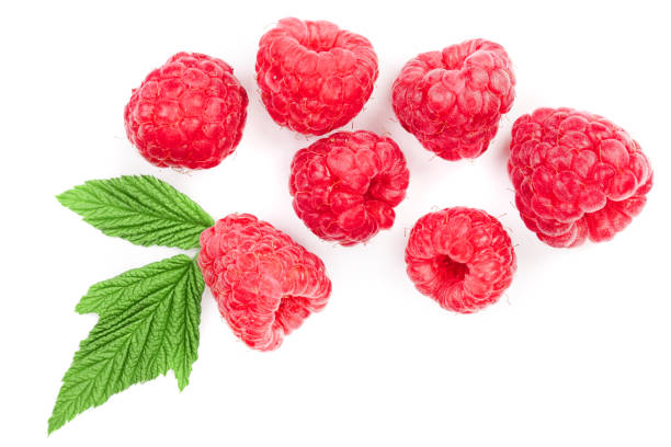 istock raspberries with leaves isolated on white background. Top view. Flat lay pattern 1072899660