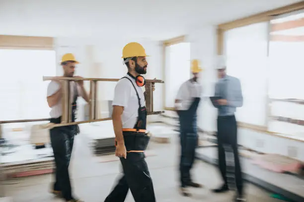 Photo of Working at construction site in blurred motion!