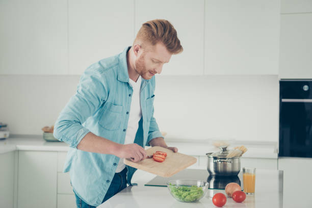 istock Profile side view good-looking good-wearing man in denim jeans s 1072905764