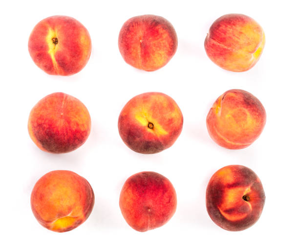 istock ripe peaches isolated on white background. Set or collection 1072909332