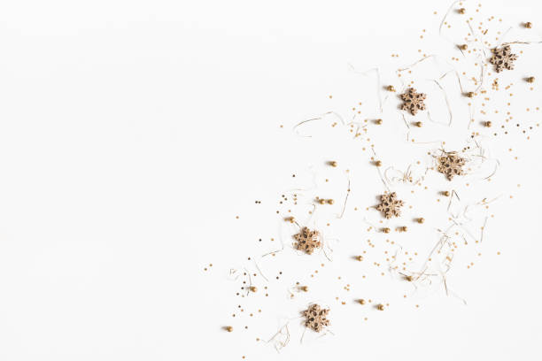 istock Christmas composition. Christmas golden decorations on white background. Flat lay, top view, copy space 1072909532