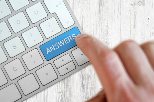 istock Answers Icon Concept on the Blue Keyboard Button 1072909916