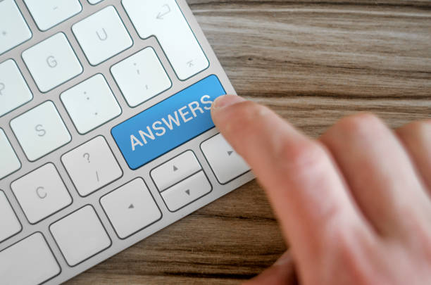 istock Answers Icon Concept on the Blue Keyboard Button 1072910040
