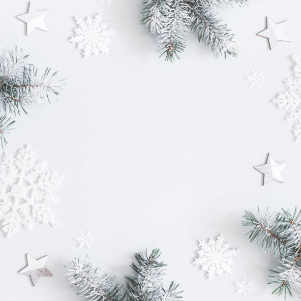 istock Christmas composition. Frame made of fir tree branches, decorations on pastel gray background. Christmas, winter, new year concept. Flat lay, top view, copy space, square 1072912924