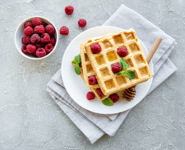 istock Homemade waffles with berries 1072920138