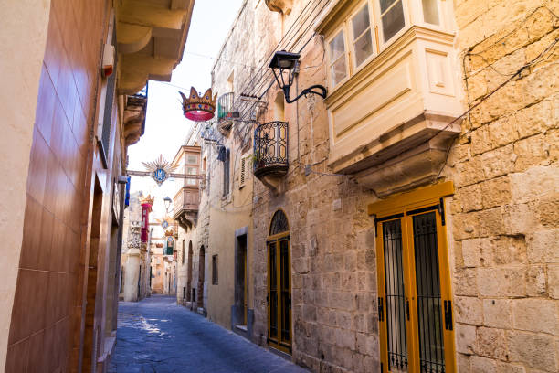 istock Ancient narrow streets in old town Mdina, Malta 1072929278