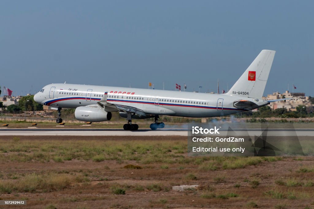 Russian modern Tu-214 airliner Russia State Transport Company Tupolev Tu-214 landing runway 32. Aerospace Industry Stock Photo