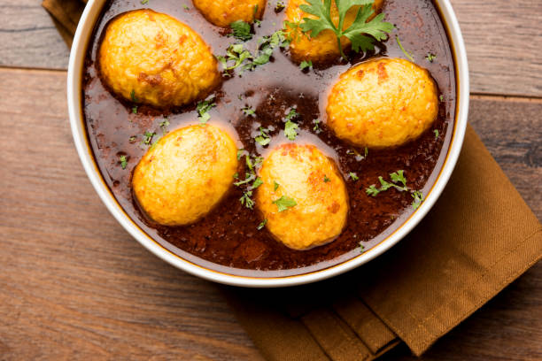 istock Fried egg curry or anda masala served in a bowl. selective focus 1072933772