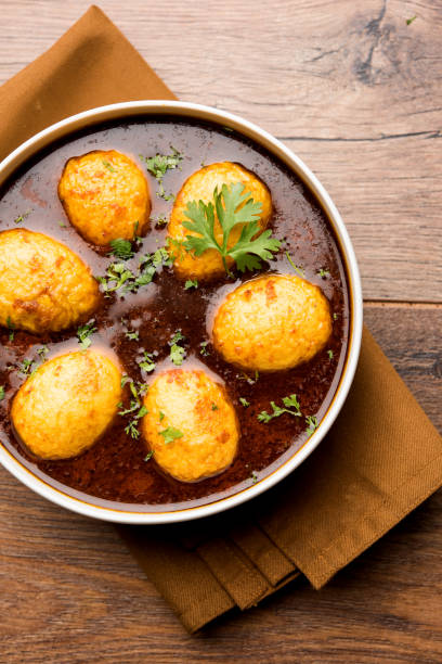 istock Fried egg curry or anda masala served in a bowl. selective focus 1072933778