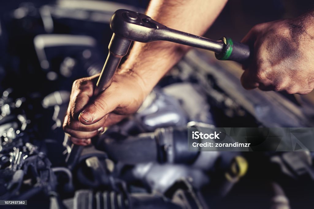 Repairing engine in auto repair shop Diesel Fuel Stock Photo