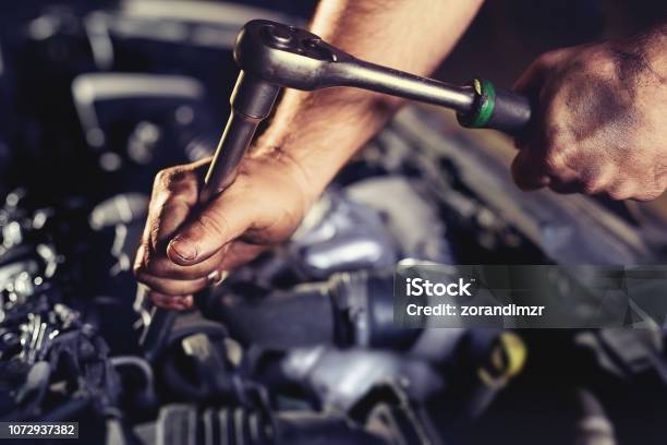 Repairing Engine In Auto Repair Shop Stock Photo - Download Image Now - Diesel Fuel, Engine, Machine Valve