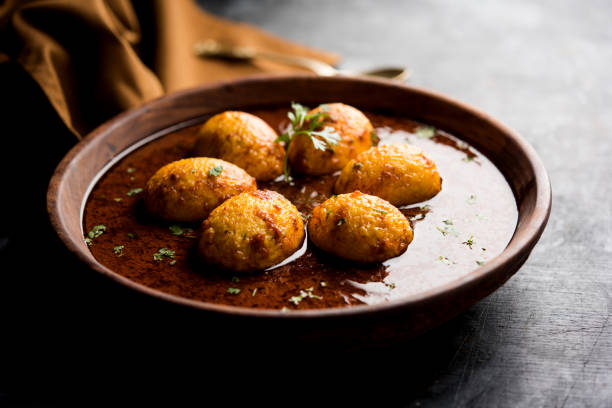 istock Fried egg curry or anda masala served in a bowl. selective focus 1072937426