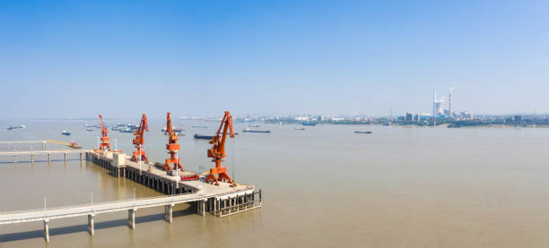 istock inland river modern cargo wharf panorama 1072937842