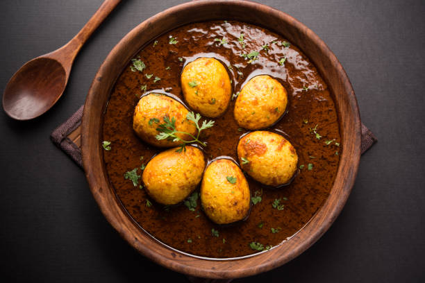 istock Fried egg curry or anda masala served in a bowl. selective focus 1072940148