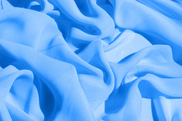 istock Background texture, pattern. Azure Blue Silk Twill. Here is a deluxe azure blue silk twill perfect for a vast array of applications. Almost as soft as a cloud, this remarkable silk has a supreme drape 1072940270