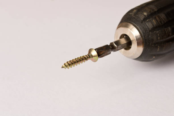 istock Self-tapping screw driver . Isolated on white background. Close up 1072941836