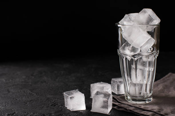 istock tall empty glass with ice in it and near 1072946328