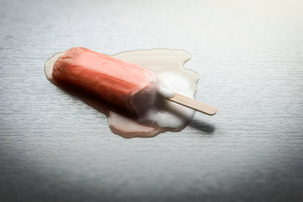 istock A strawberry popsicle is melting 1072961762