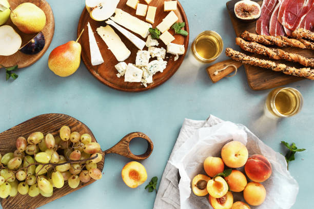 istock Appetizers table spanish tapas cheese variety fruits jamon Top view flat lay 1072962590