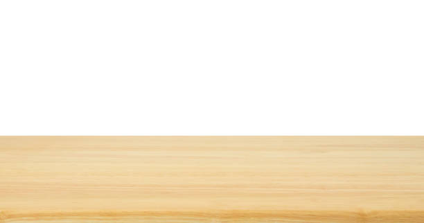 istock Empty wood table top isolated on white background 1072962612