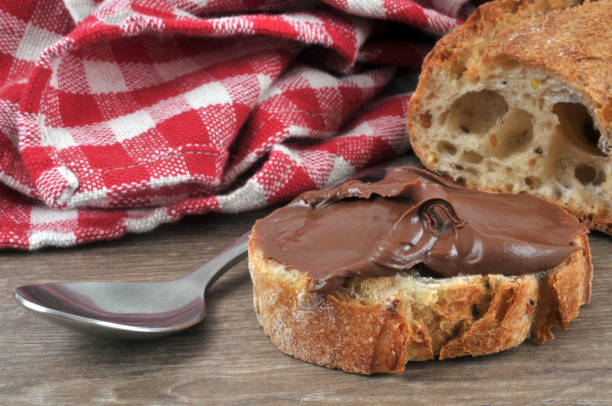 istock Slice of bread with chocolate spread 1072967004