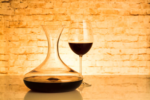 istock Red Wine in Decanter and Glass on Table 1072970906