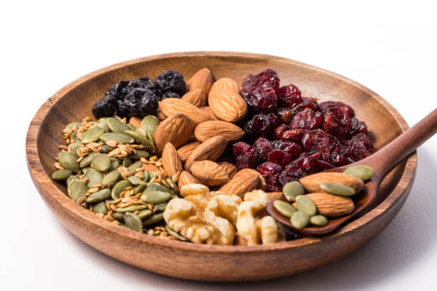 istock Variety of tasty fresh nuts. 1072972888