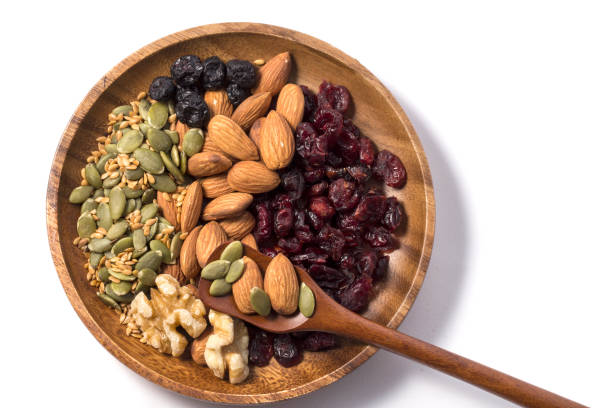 istock Variety of tasty fresh nuts. 1072972928