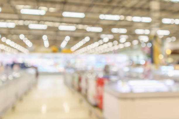istock supermarket grocery store interior blurred defocused background with bokeh light 1072974194