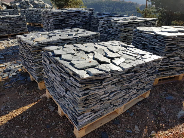 Stone Tiles on Several Pallets in a Quarry stock photo