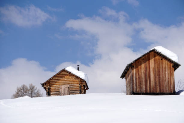 wood cabin hut in the winter snow background