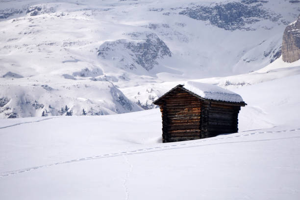 wood cabin hut in the winter snow background