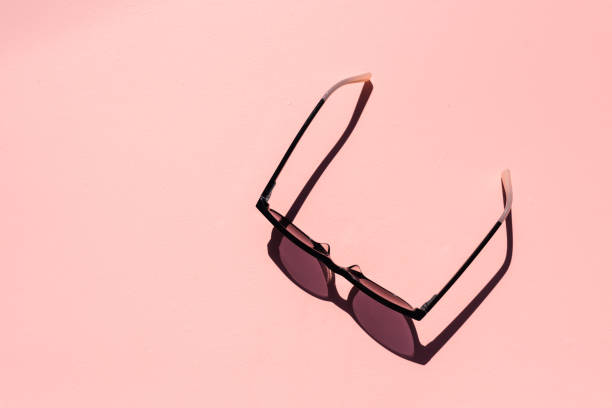 istock Directly Above Shot Of Sunglasses Over Colored Background 1072989028