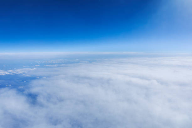 istock Beautiful view through airplane window. Happy journey above the sky. 1072989426