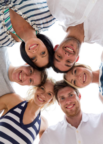 istock smiling friends in circle 1072998782