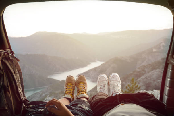 istock Happy Young Couple Camping in Mountain 1073001702